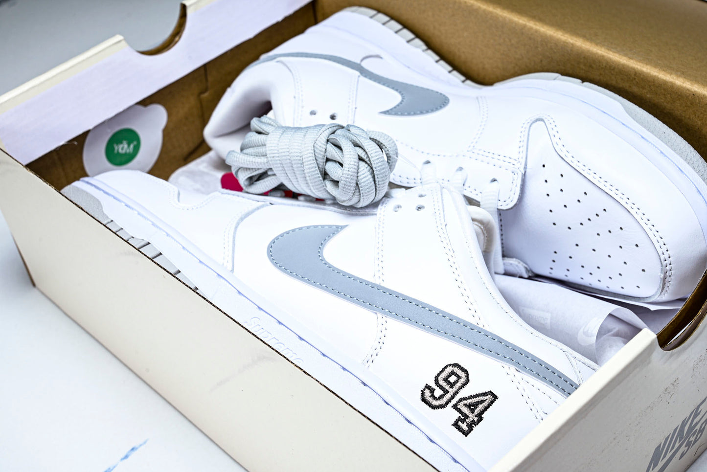 SB Dnk Low x Supreme 94 White Metallic Silver